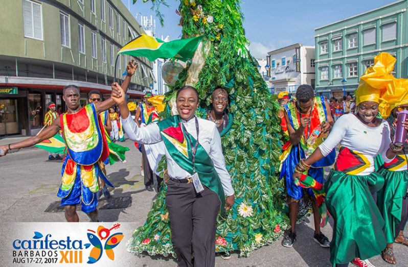 Flashback! Minister of Education Dr. Nicolette Henry alongside few Guyanese delegates at the Road Parade of CARIFESTA XIII which was held in Barbados in 2017 [DPI photo]