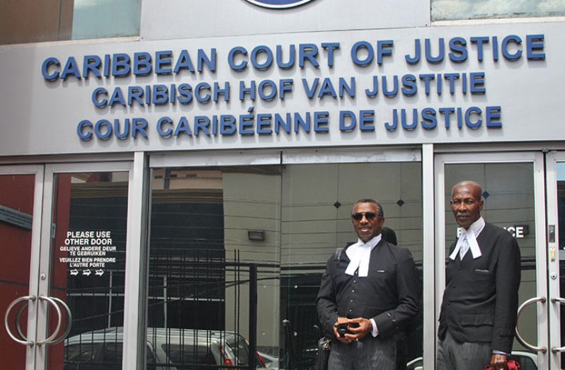 Barbadian Queen’s Counsel Ralph Thorne and Hal Gollop outside of the CCJ after defending President David Granger’s appointment of Justice James Patterson, Chairman of GECOM