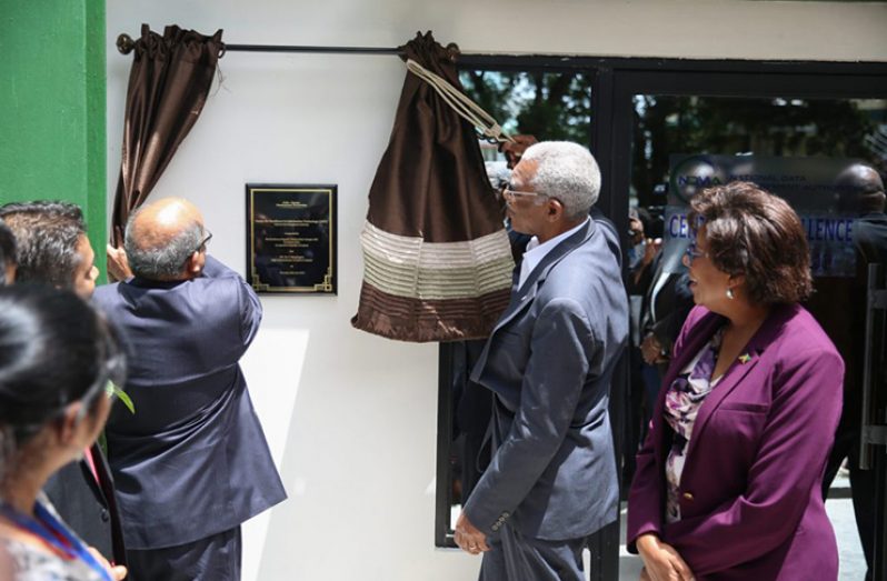 H.E. President David Granger and former Indian High Commissioner to Guyana Venkatachalam Mahalingam unveil the plaque to commission the Centre for Excellence in Information Technology in June 2019. Looking on is Telecommunications Minister Hon. Catherine Hughes