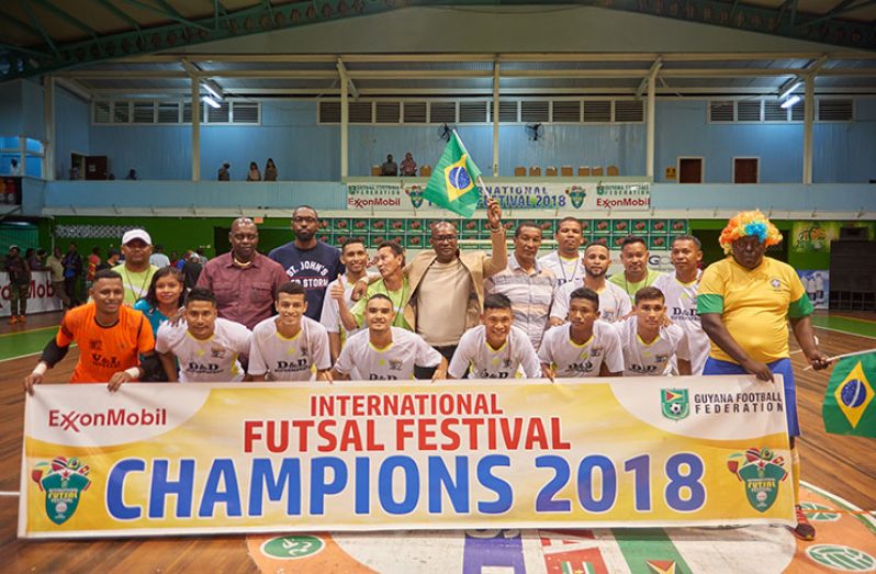 CHAMPS! The victorious Roraima Galacticos following their 4 – 1 win over Morvant Caledonia United in the finals of the GFF/ExxonMobil International Futsal tournament.