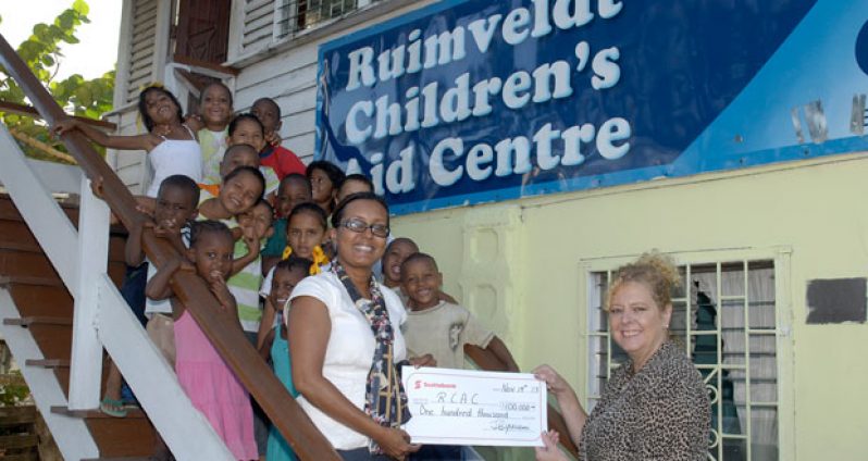 Scotiabank Marketing Manager Jennifer Cipriani presents the cheque to Jessica Hatfield, Patron of the RCAC