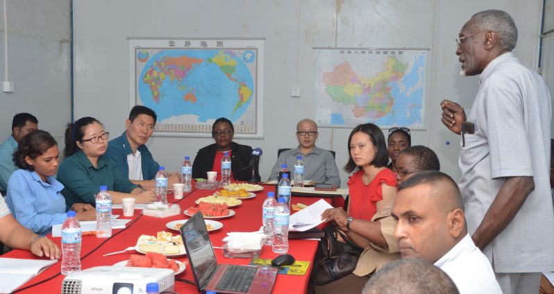 Consultant to the  labour department in the Ministry of Social Protection Francis Caryll, makes a point during his presentation on the labour laws to representatives of six Chinese companies operating in Guyana in the presence of subject minister Simona Broomes and other ministry representatives