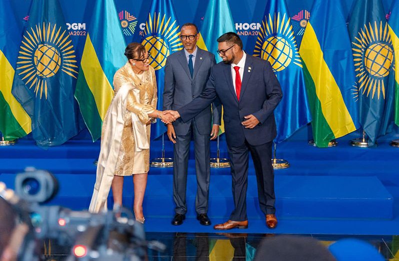 President Ali warmly greets Commonwealth SG Scotland (left) and Rwanda’s President Kagame (centre) on stage at the 2022 CHOGM opening ceremony in Kigali (Office of the President photo)