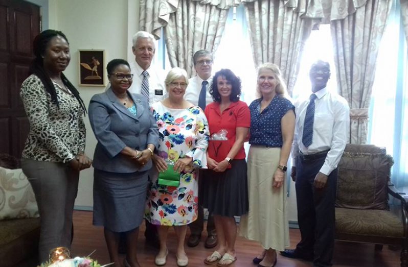 Minister of Public Health Volda Lawrence (second left) stands along with Maternal and Child Health (MCH) Officer (ag) from the Ministry of Public Health, Dr. Oneka Scott (first left) and members of The Church of Jesus Christ of Latter-Day Saints’ trained team.
