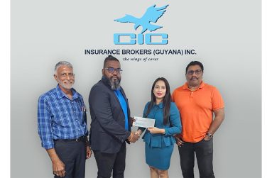 Assistant General Manager of CIC Insurance Brokers (Guyana) Inc. Preneta Bharosay (second right) presents the sponsorship to Vice-president of the DCB, Puneet Jaigopaul in the presence of other DCB reps Davteerth Anandjit (left) and Anil Beharry