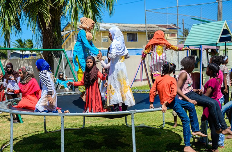 Children jumping on the trampoline which was part of the attractions organised by the CIOG