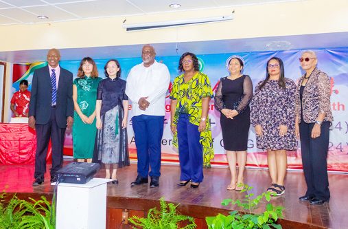 Prime Minister Brigadier (ret’d) Mark Phillips and his wife, Mrs. Mignon Bowen-Phillips (centre); Vice-Chancellor of UG, Professor Paloma Mohamed Martin (third from right); Dean of the Faculty of Education and Humanities Dr. Rosalin Khan (second from right); Guyanese Director of the CIUG Al Creighton (left); Chinese Director of the CIUG Dr. Geo Zhiyan (second from left) and Chinese Ambassador Guo Haiyan (third from left)