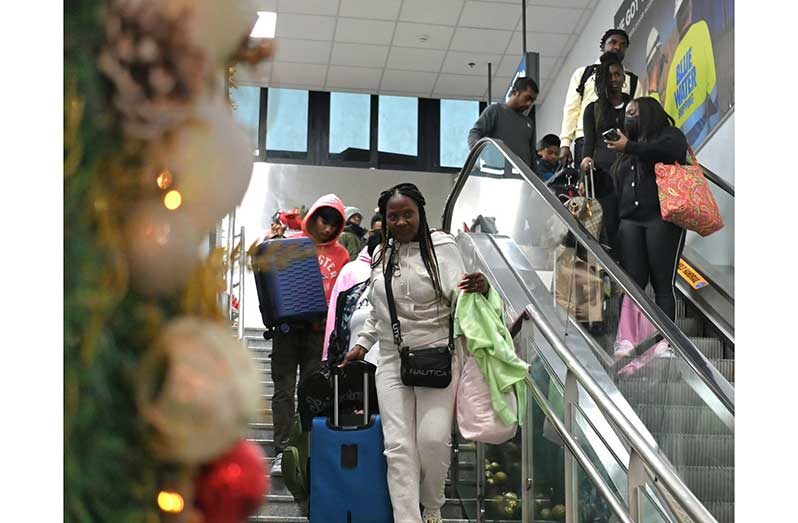 Passengers arriving at Cheddi Jagan International Airport (CJIA Photo)