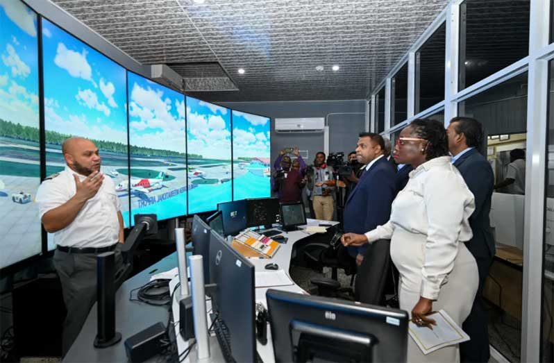 A staff member explaining how SARIMS works