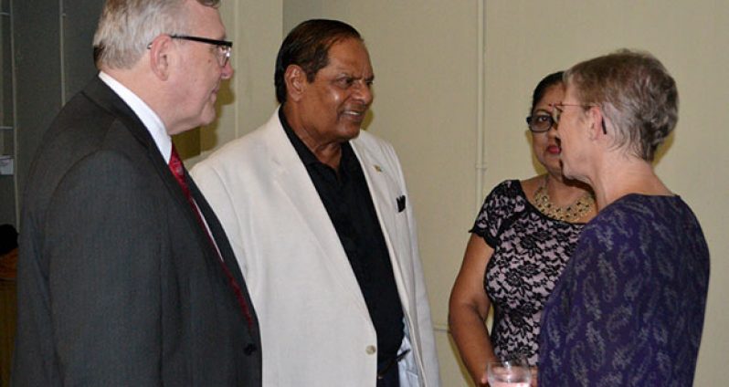 Prime Minister Moses Nagamootoo greets Ms Jan Sheltinga, Counsellor Development Cooperation who takes up office here on behalf of the Canadian government  
Canadian High Commissioner to Guyana, Pierre Giroux is at left while Mrs Sita Nagamootoo is partly hidden