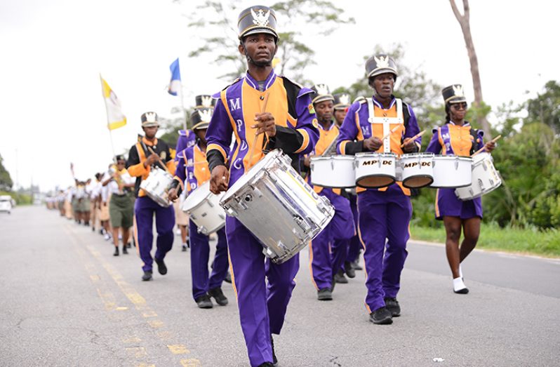 Master-guides, Pathfinders and Adventurers parade through the streets of Georgetown (Samuel Maughn photo)