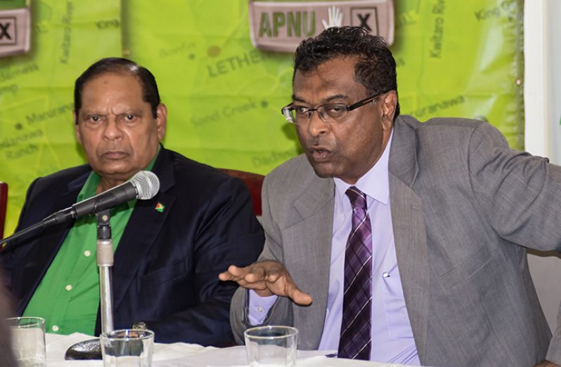 Prime Minister and acting President Moses Nagamootoo and Minister of Public Security and Chairman of the Alliance For Change (AFC), Khemraj Ramjattan  (Delano Williams photo)