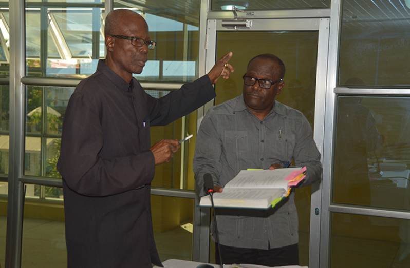 Town Clerk, Royston King (right) with his lawyer, Maxwell Edwards (Photo by Adrian Narine)
