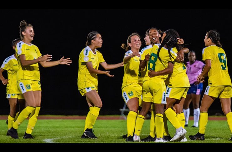 It’s a celebration! Jenea Knight is swarmed by her teammates after scoring her second goal on the night to lead Guyana to a 2 - 0 win over Bermuda in the CONCACAF U-20 Championships Qualifiers.