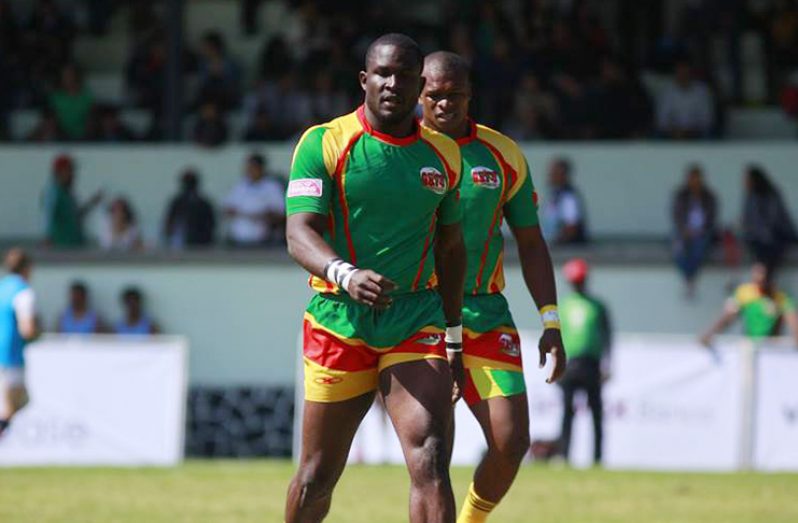 Avery Corbin (first left) was Guyana’s top try scorer on day one of the Rugby Americas North (RAN) 7s Championship in Barbados.