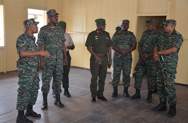 Chief-of-Staff, Brigadier Patrick West speaking to other senior ranks during the site visit at Guyana People's Militia Drill Hall