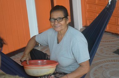 Kimwattie is a resident of Massiah #71 Village,
Corentyne, Berbice. Now retired after
34 years working with the sugar industry,
the 69-year-old spends her days keeping
busy with house chores. She admits that
she is committed to the traditional way of
life and prefers to cook her food on her
outdoor fireside (Carl Croker photo)