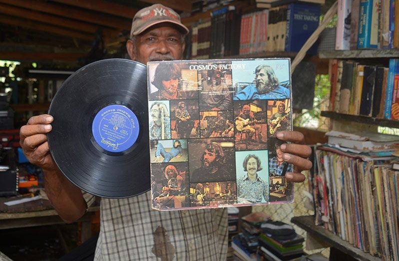 Jainarine displaying some of his antiques (Carl Croker photos)