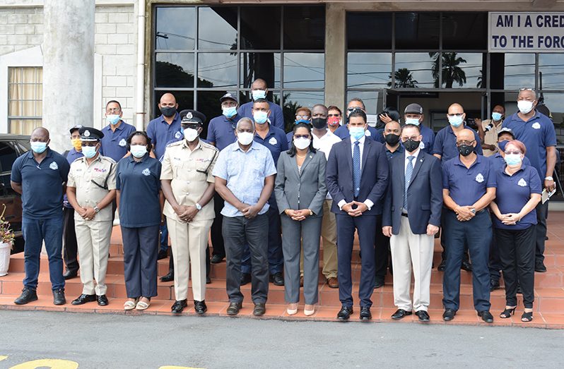 Home Affairs Minister, Robeson Benn (fifth from left) flanked by Police Commissioner, Nigel Hoppie; Permanent Secretary at the Ministry, Mae Toussaint Jr. Thomas; Culture, Youth and Sports Minister, Charles Ramson Jr. and Security Adviser to the Minister of Home Affairs, Harry Gill (third from right) along with CPG and law enforcement officials