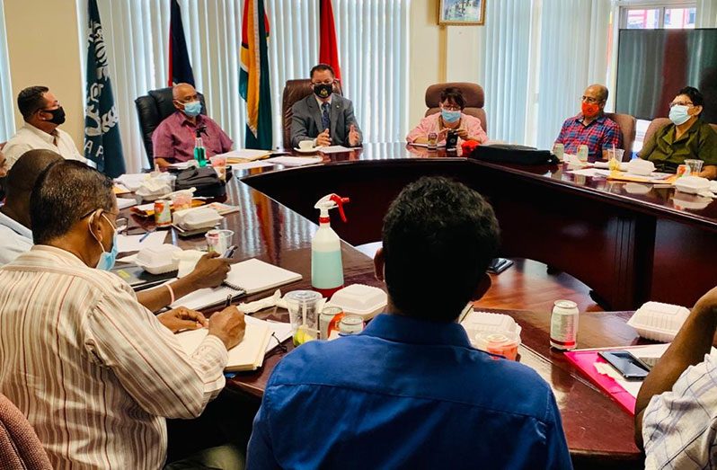 Adviser to the Home Affairs Minister, Harry Gill, and CPG Administrator, Reshi Das, in one of the monthly meeting with Liaison Officers and Divisional Chairmen of the CPG in the Ministry of Home Affairs boardroom