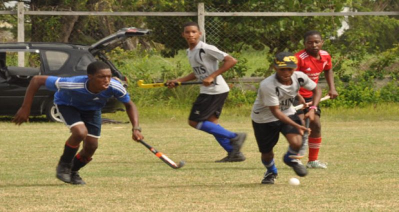 Part of the action Sunday during the first tournament at the St. Stanislaus College Ground