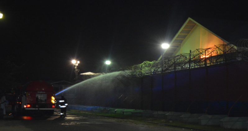 Fire fighters battling to put out the fire at the Camp Street Prison