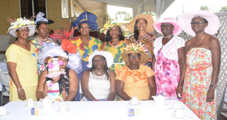 Some of the women police with their hats on display
