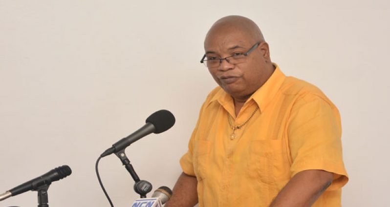 Bishop Juan Edghill, Minister within the Ministry of Finance, addressing the gathering at the workshop on gender-based violence