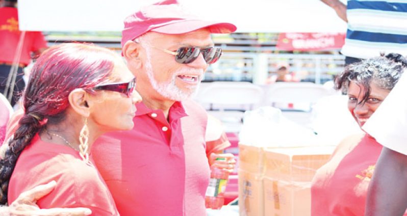 President Donald Ramotar greeting members of the public who turned out for the May Day parade yesterday