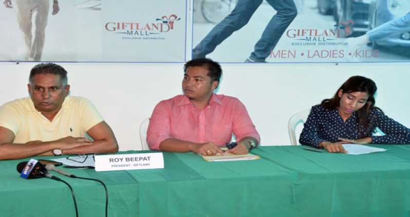 President of Giftland Roy Beepat, Giftland Mall Property Manager Christian Bautista and Levi’s and Dockers representative, Crystal Ramdeo, at yesterday’s media briefing (Samuel Maughn photo)