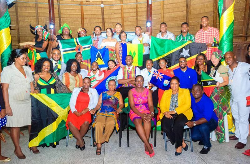 The Caribbean Youth Ambassadors pose for a group photo with Minister Nicolette Henry (seated at centre); Programme Manager (Culture and Community Development) at CARICOM Secretariat, Dr. Hilary Brown (seated at right); Director of Youth, Melissa Carmichael Haynes (seated at far left); and other stakeholders