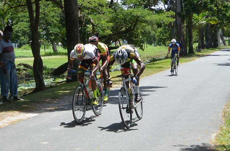 Curtis Dey (right) crosses the finish line just ahead of Christopher Griffith and Jamual John to take the Lucozade 11-race title.