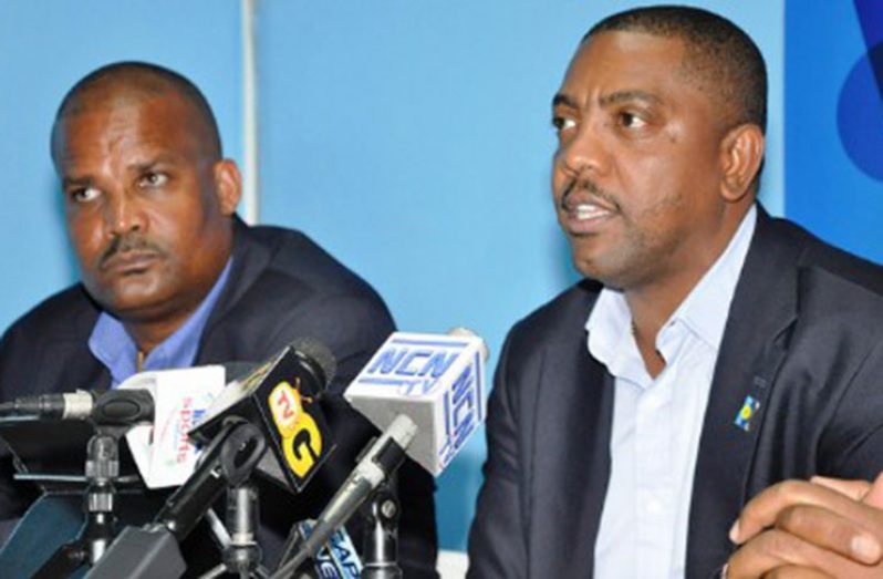 Dave Cameron (right) and Emmanuel Nathan lost in their bid to return as president and vice-president respectively of Cricket West Indies