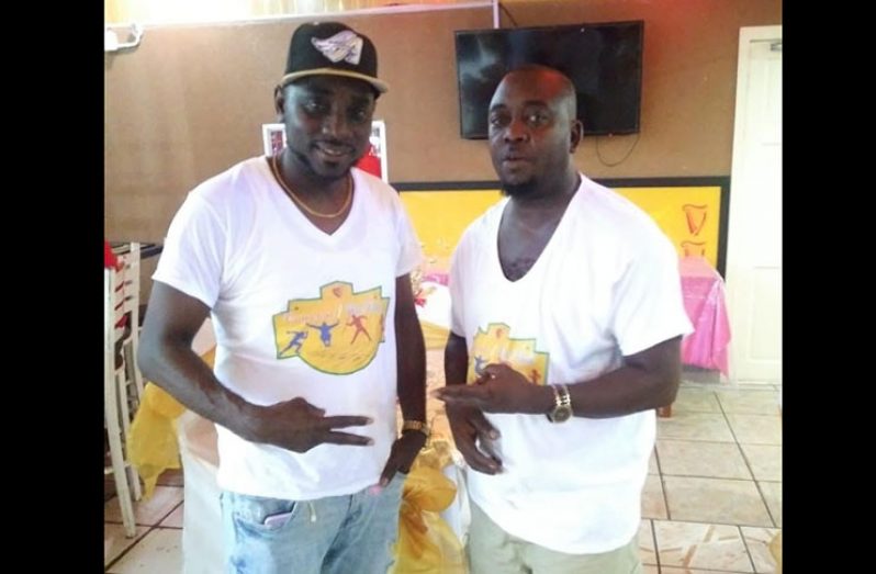 WE READY! Organisers Floyd Cameron at left and Erwin Shawn 'Baldhead' McNeil are wearing the promotional jersey for the 'MHS versus Multi' Track and Field clash at MSC ground tomorrow.