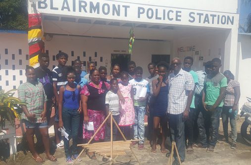 Members of the youth group with Inspector C Kelly (third from left) and Assistant Superintendent of Police, Mark Vigilance, fourth from right