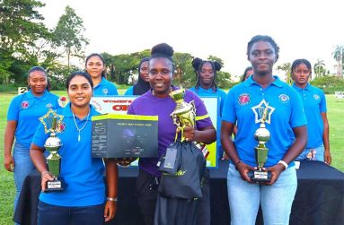 (Front) MVP Sherica Campbell is flanked by Varuni Pitamber (left. Most wickets) and Naomi Barkoye (Most runs)