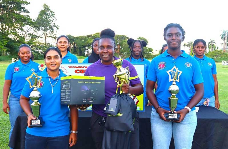 (Front) MVP Sherica Campbell is flanked by Varuni Pitamber (left. Most wickets) and Naomi Barkoye (Most runs)