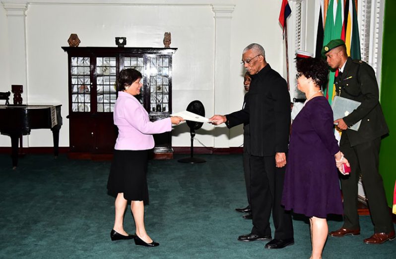 Canada’s High Commissioner to Guyana, Lilian Chatterjee, presents her Letters of Credence to President David Granger, in the presence of Minister of Foreign Affairs, Carl Greenidge, (left and partly hidden) and Director General Ministry of Foreign Affairs, Audrey Waddle, (right) on Wednesday at State House (MoTP photo)