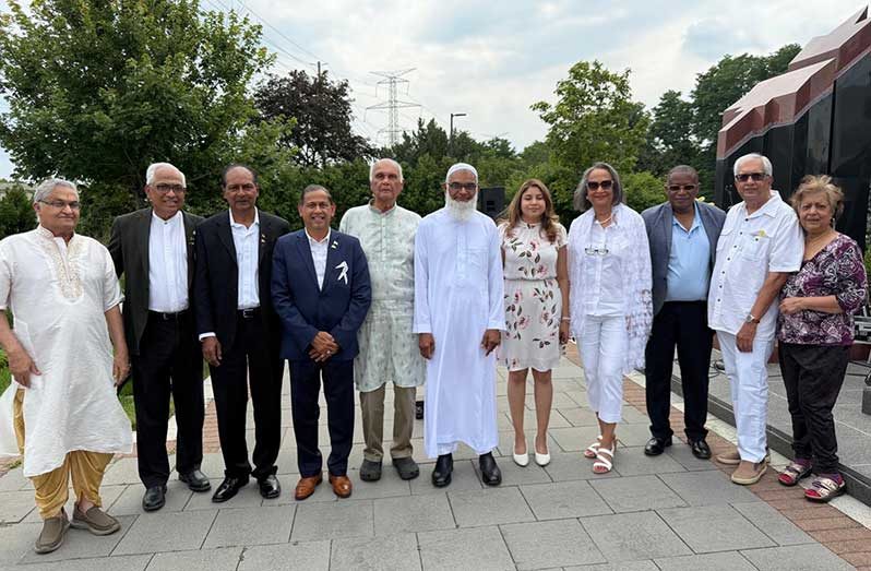 Part of the gathering at Sunday’s service. Honorary Consul Mani Singh is fourth from left. Others in picture, include Dr Doobay and Dr Shabir Ally, fifth and sixth from left respectively along with Winston and Kameni Kassim at extreme left