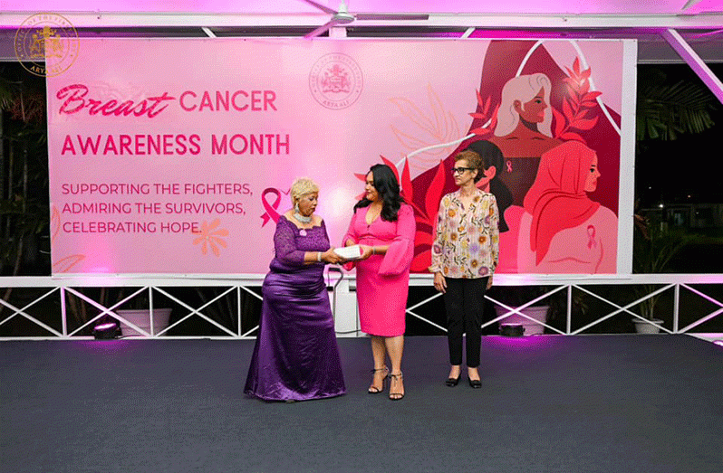 First Lady, Arya Ali handed over the vouchers to Founder of Guyana Cancer Foundation Bibi Hassan for cancer patients, survivors, healthcare workers, and other partners, leading the fight against breast cancer
