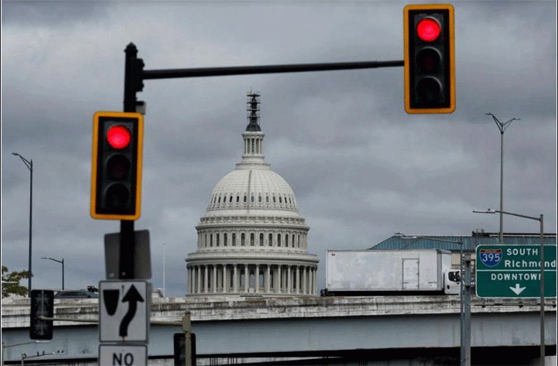A general view of the U.S. Capitol, where Congress will return Tuesday to deal with a series of spending bills before funding runs out and triggers a partial U.S. government shutdown, in Washington (REUTERS/Jonathan Ernst)