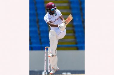 Kraigg Brathwaite gathers runs stylishly during his top score of 85.