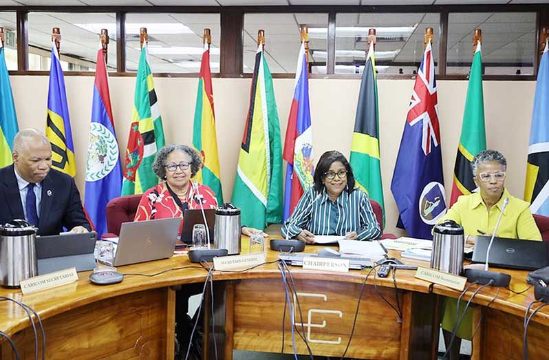 From left, Ambassador Wayne McCook, Assistant Secretary-General, CARICOM Single Market and Trade; Dr. Carla Barnett, CARICOM Secretary-General; Chair of the Meeting, Senator the Hon Paula Gopee-Scoon, Minister of Trade and Industry of Trinidad and Tobago, and Michele Lowe, Director External Trade (ag)