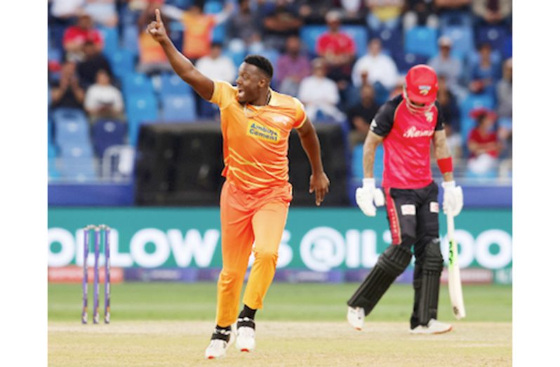 Carlos Brathwaite (left) celebrates after taking the wicket of Desert Vipers opener Alex Hales (ILT20 photo)