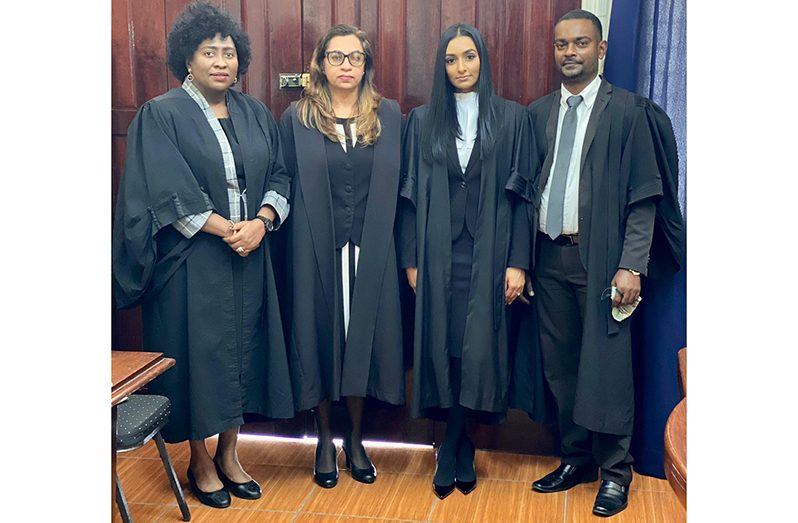 Attorney-at-law, Casey D’aguiar (second from right) with Justice Priya Sewnarine-Beharry (second from left); attorney-at-law, Kim Kyte-Thomas (far left) and attorney-at-law George Thomas (far right) following her admission ceremony