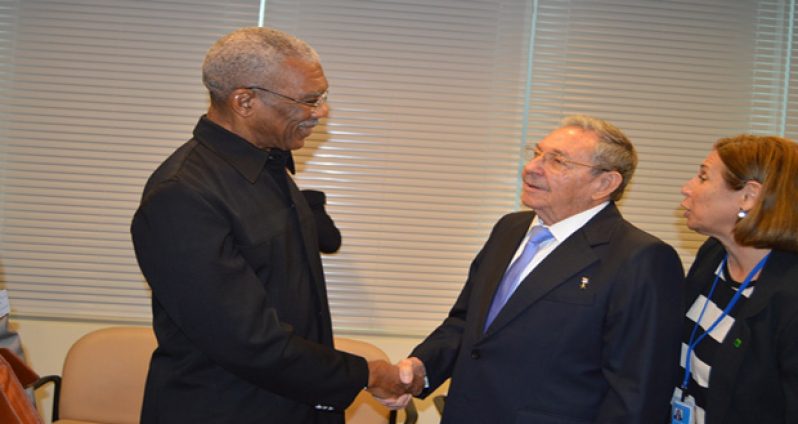 President David Granger and Cuba’s President Raul Castro greet each other in New York