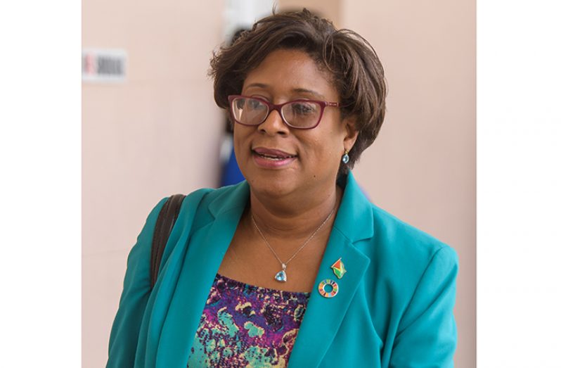 Minister of Public Telecommunications Cathy Hughes