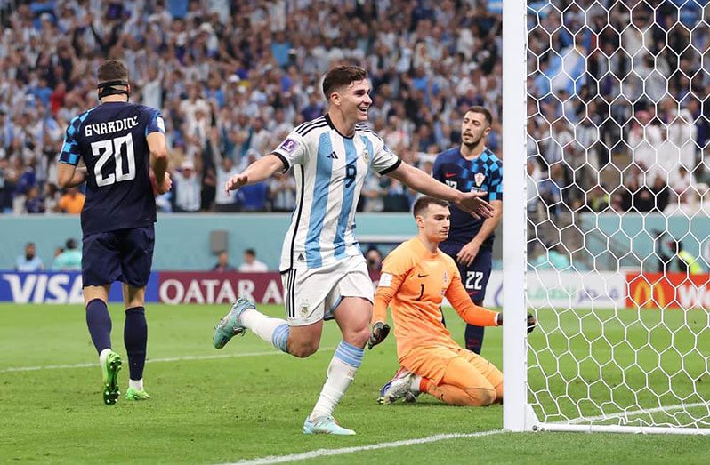 Julian Alvarez celebrates scoring his second and Argentina's third in the 3-0 win over Croatia in the World Cup semi-final. On Tuesday (Photo by Lars Baron/Getty Images)