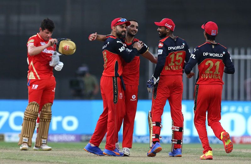 RCB celebrate their win over Punjab Kings, and their ticket to the IPL 2021 play-offs, Royal Challengers Bangalore vs Punjab Kings, IPL 2021, Sharjah, October 3, 2021 © BCCI
