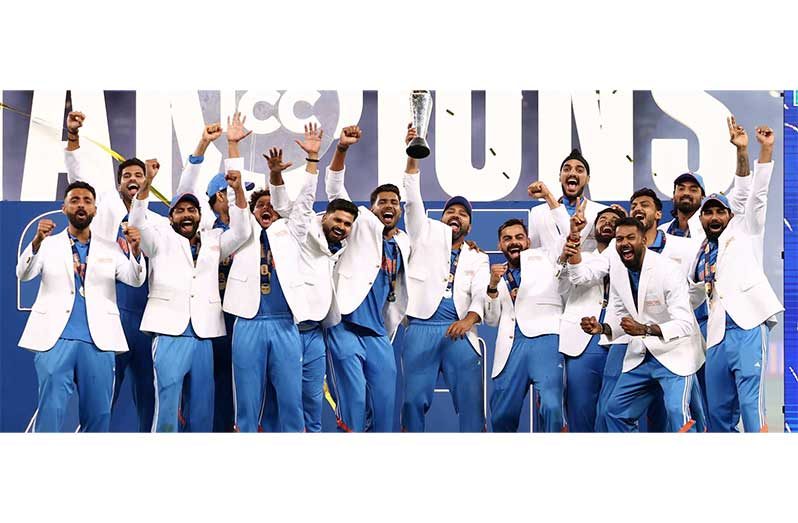 Champions India celebrate their victory over New Zealand